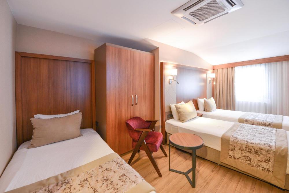 Deluxe Triple Room